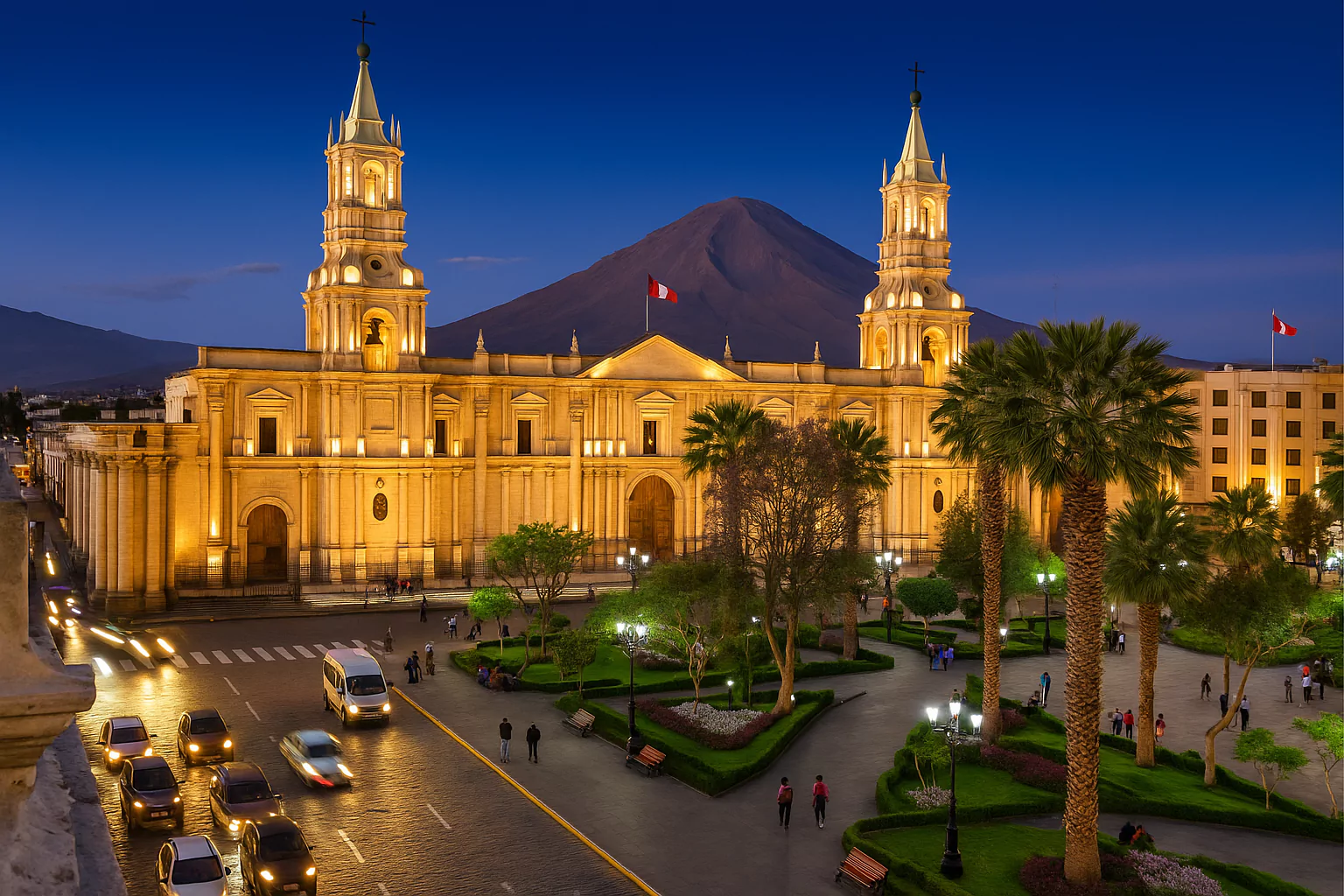 Arequipa Cathedral illuminated at night with Misti Volcano in background